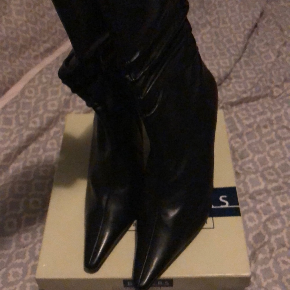 Calf height black leather boots